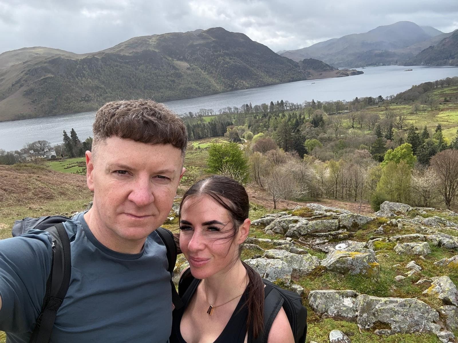Frances and James on a fell walk above a lake