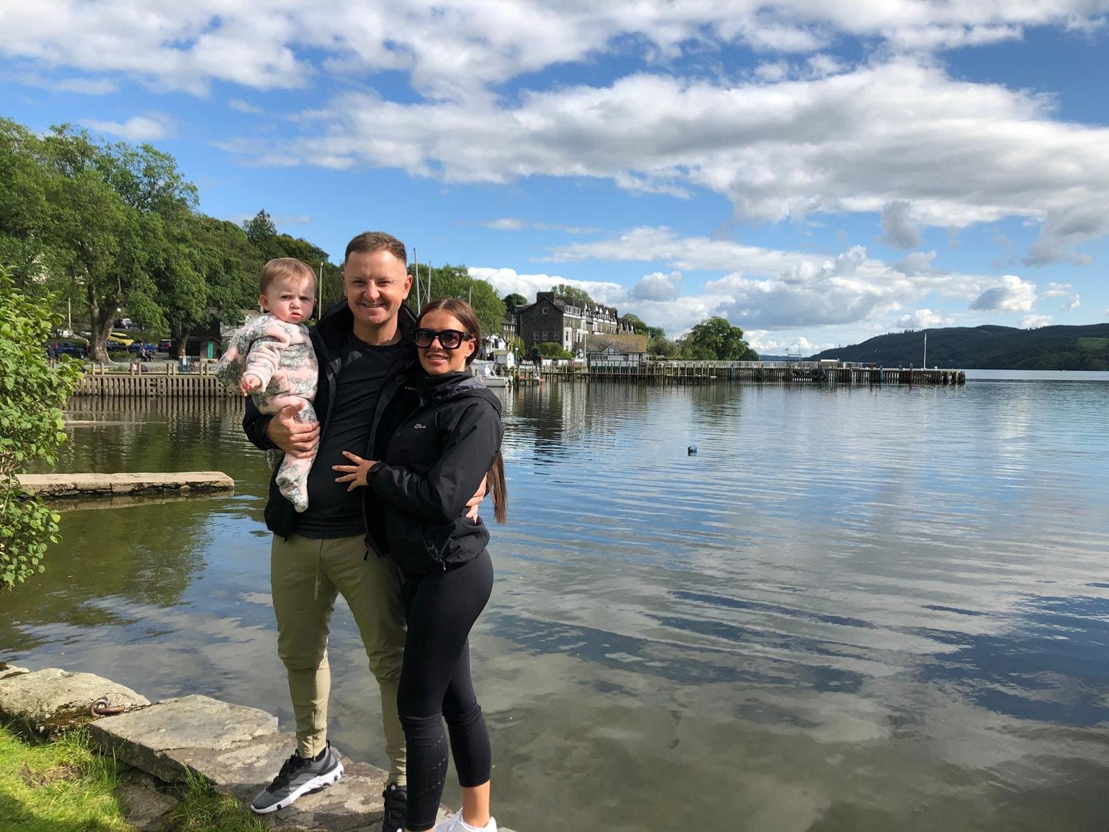 Frances and James by the lake with family