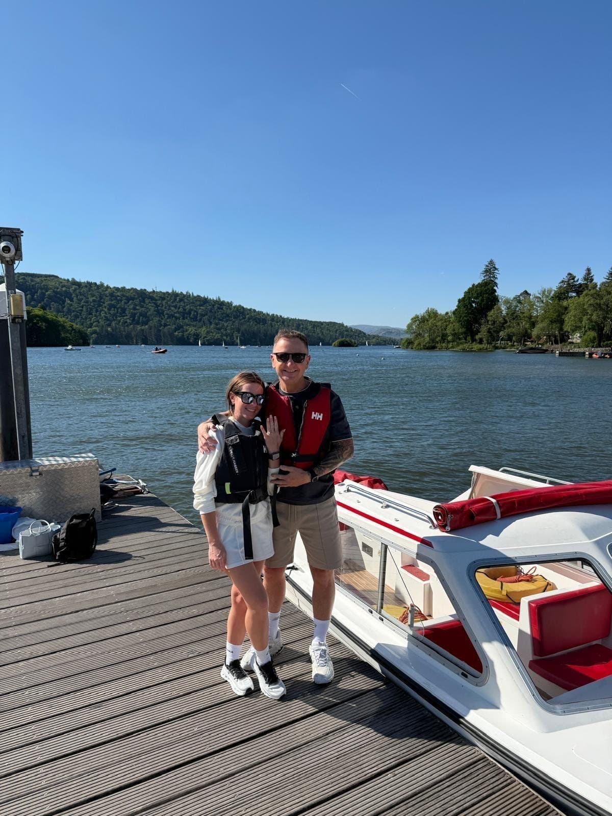 Frances and James on the jetty on the day they got engaged